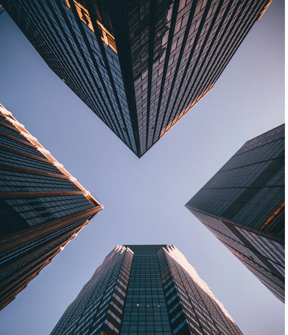 Tall city buildings viewed from below